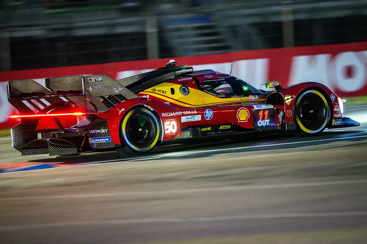 Ferrari 51 suffering a puncture during the Spa 24H, captured at the moment of the race setback. Focus keywords: Ferrari 51 – Spa 24H – puncture – race setback. © RNT Motorsports