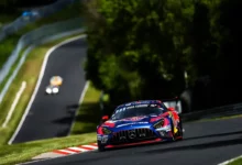 Max Verstappen driving the Winward Racing Mercedes‑AMG GT3 through the rolling hills of the Nürburgring Nordschleife. © 24h Nürburgring Media.