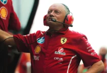 Ferrari team principal Fred Vasseur with a headset in the Ferrari garage