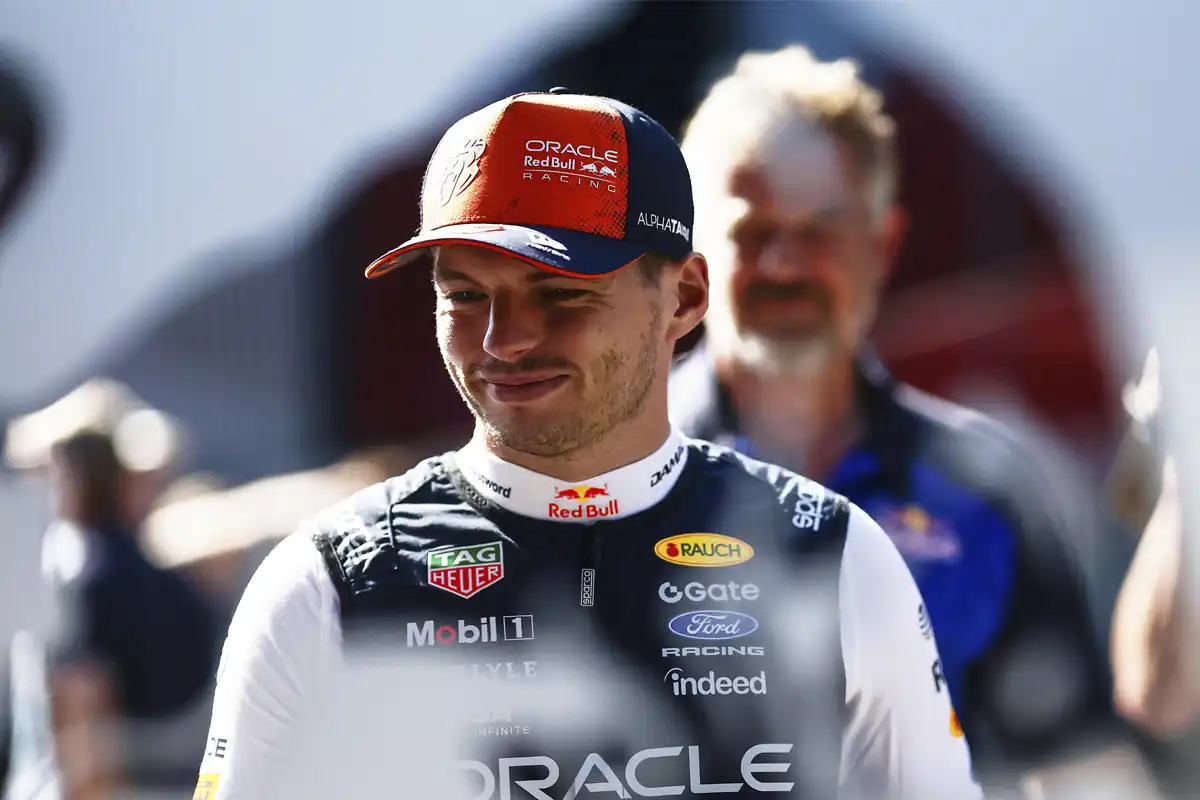 Max Verstappen reacts amid McLaren rumours as Zak Brown comments on Verstappen future McLaren move with banana‑peel quote; British GP driver market speculation 2026. ©RedBullMedia