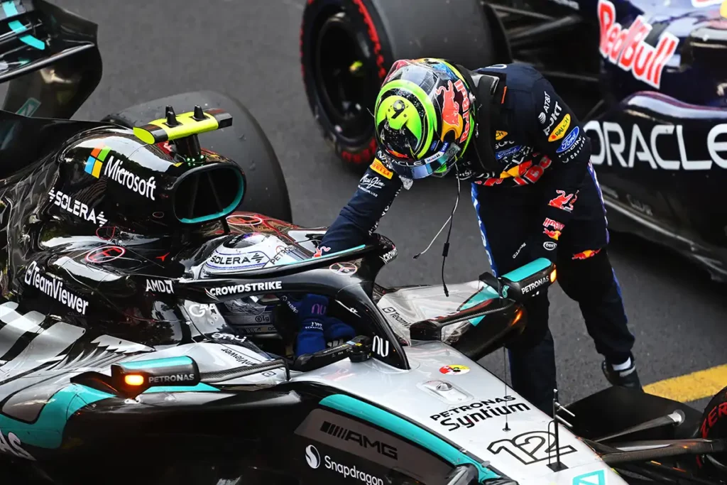 Andrea Kimi Antonelli celebrates his Monaco GP victory with Isack Hadjar in parc fermé, despite Mercedes currently running a weaker combustion engine than Red Bull under the FIA’s ADUO assessment.