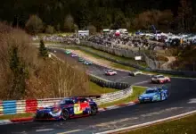Max Verstappen attacks Christopher Haase in heavy traffic during NLS5 Nordschleife. Copyright VLN Media.