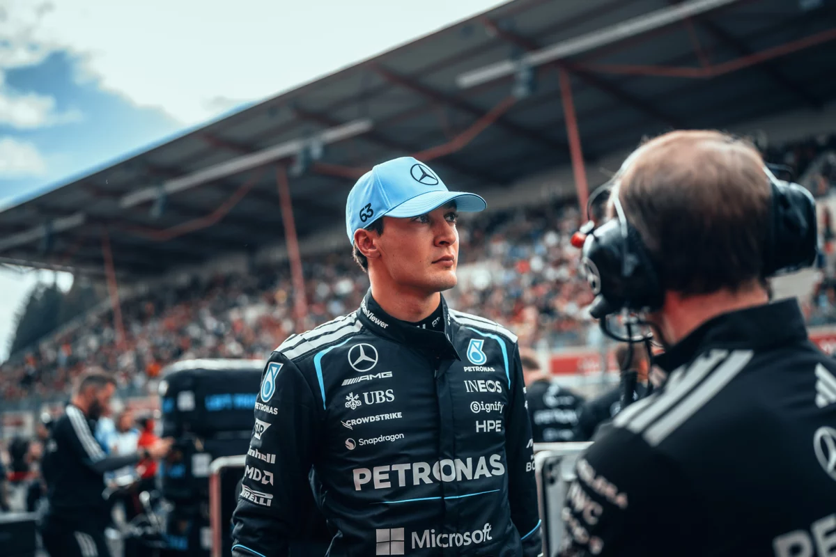 George Russell looks concerned during the 2026 season, reflecting Mercedes’ growing Grid Penalty dilemma 2026.