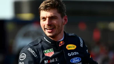 Max Verstappen looks on in parc ferme after finishing second in the 2026 Hungarian Grand Prix, reflecting on his Red Bull future amid ongoing contract talks.