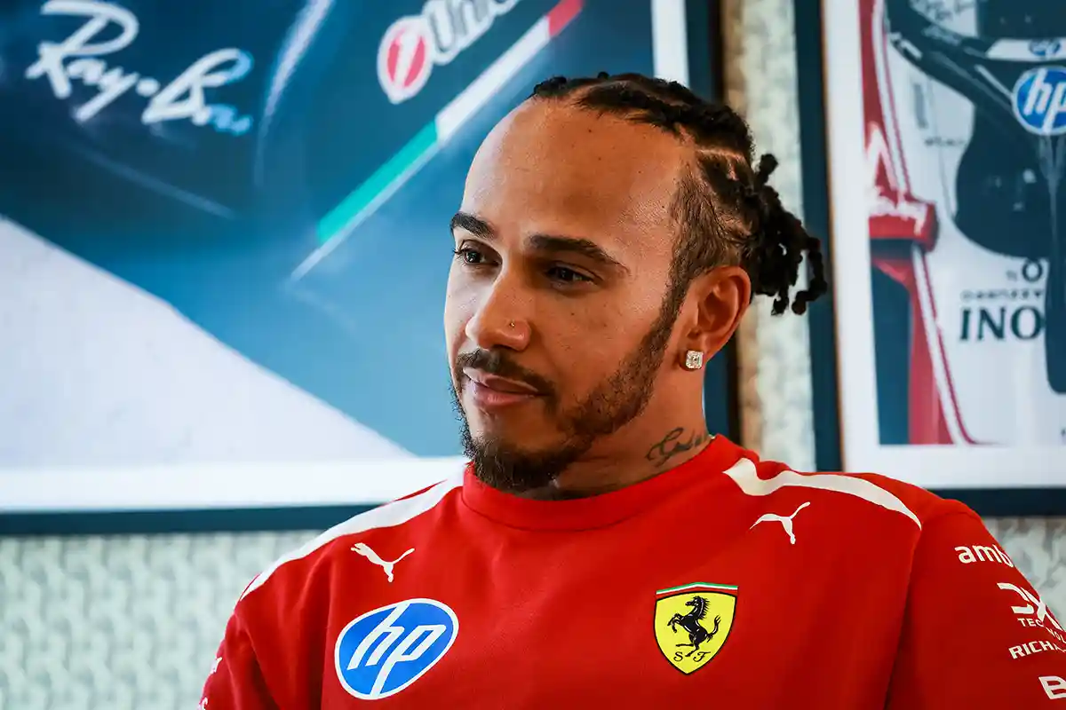 Lewis Hamilton in Ferrari overalls