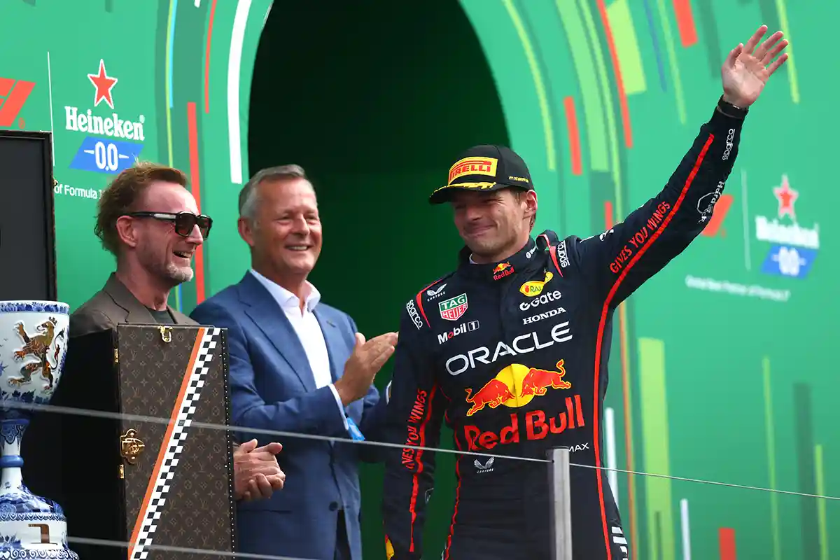 The Final Lap: Max Verstappen celebrating second place on the podium during the 2025 Dutch Grand Prix at Circuit Zandvoort.