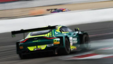 The #007 Comtoyou Racing Aston Martin at speed at the Nürburgring