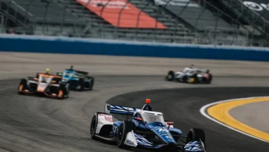 IndyCar cars racing at the Milwaukee Mile during the Snap-on INDYCAR Weekend