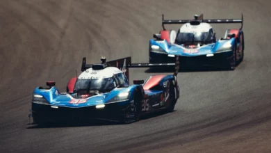 The number 35 Alpine A424 leads the number 36 Alpine A424 through a corner in the FIA WEC