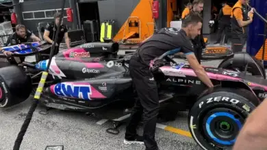 BWT Alpine mechanics work on the A526 in the pit lane ahead of the 2026 Italian Grand Prix at Monza