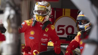 The No. 50 Ferrari crew in the pit lane at the Circuit of the Americas