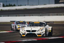 The #888 BMW Z4 GT3 ahead of the Mercedes-Benz SLS AMG GT3 of Heiko Neumann at the Nürburgring