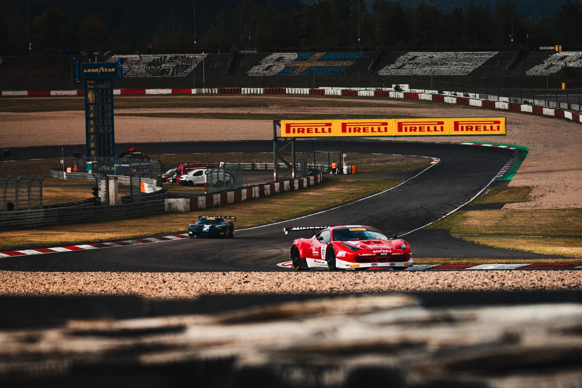 The #87 Storic and Race Cars Ferrari 458 GT3 ahead of the Ford GT at the Nürburgring in the GT3 Revival Series