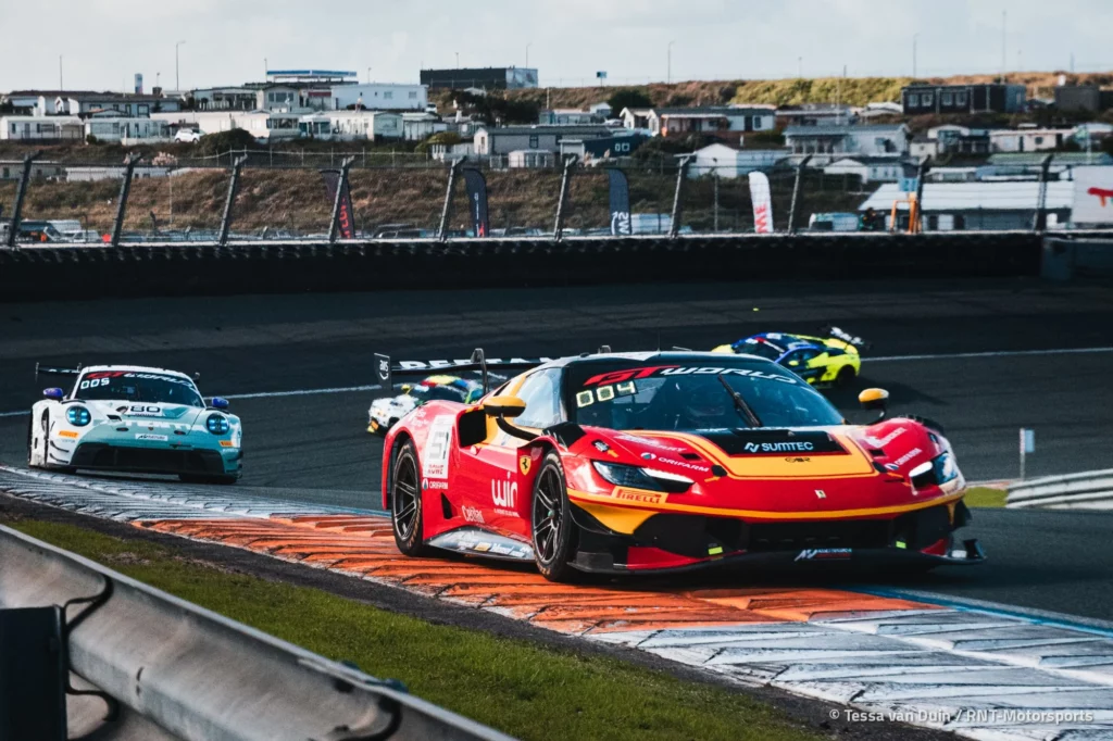 The number 51 AF Corse Ferrari 296 over the kerbs during Race 2 at Zandvoort
