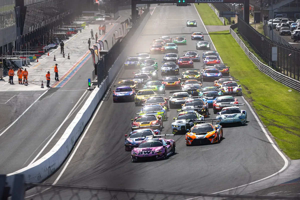 The GT World Challenge Europe field streams away from the start line at Zandvoort