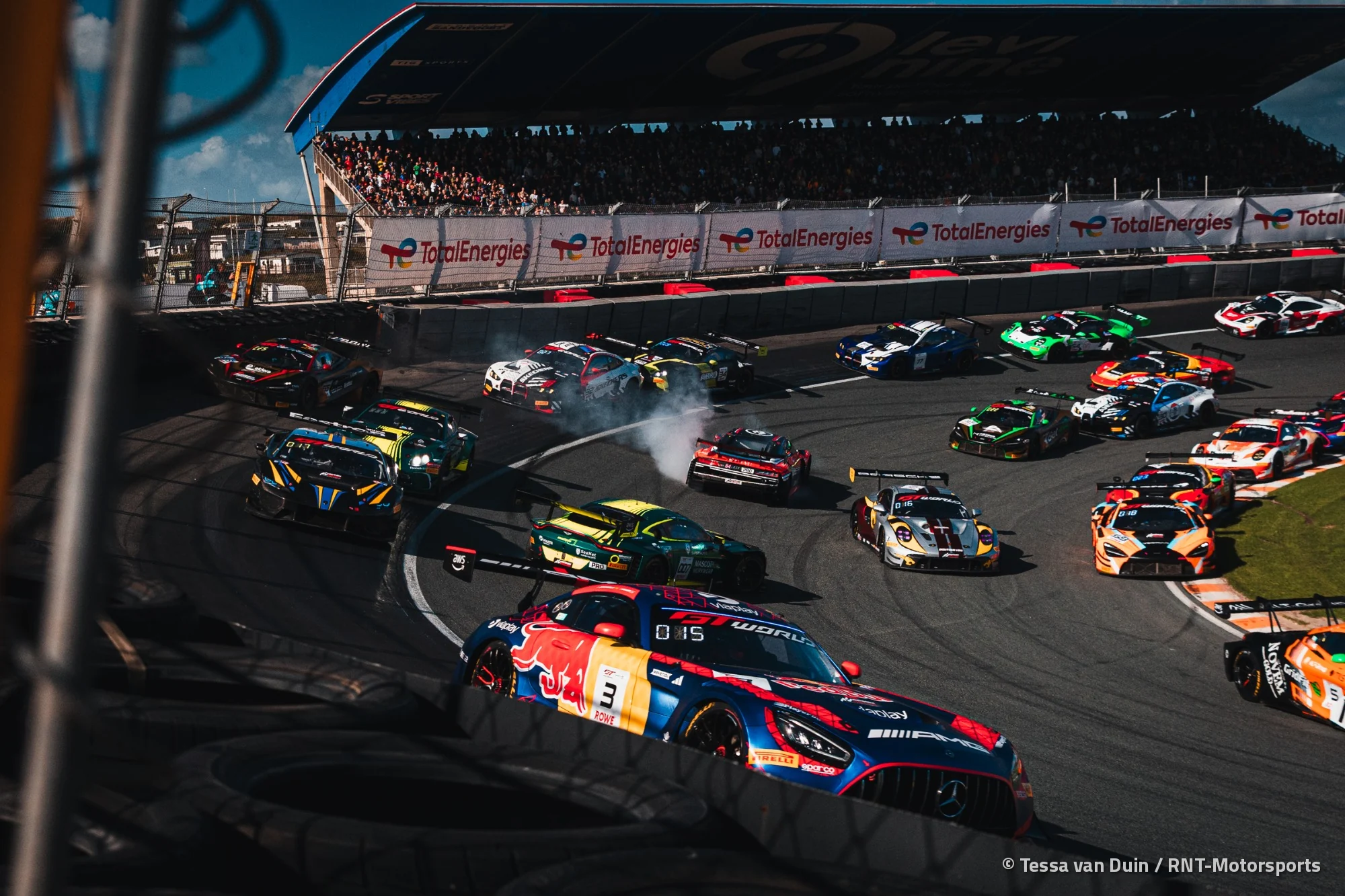 The number 3 Verstappen Racing Mercedes-AMG leads a group through the Hugenholtzbocht in Race 2 at Zandvoort