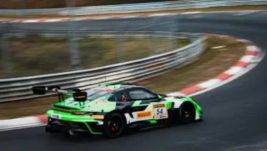 The green number 54 Dinamic GT Porsche 911 GT3 R of Loek Hartog on the Nordschleife during practice for the NLS double header
