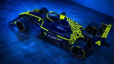 The LN4 Fusion car in dark blue and fluorescent yellow livery carrying the number 4, the junior team co-founded by Lando Norris
