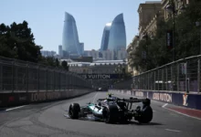 The Mercedes W17 of Kimi Antonelli on track at the Baku City Circuit with the Flame Towers behind, Azerbaijan Grand Prix 2026