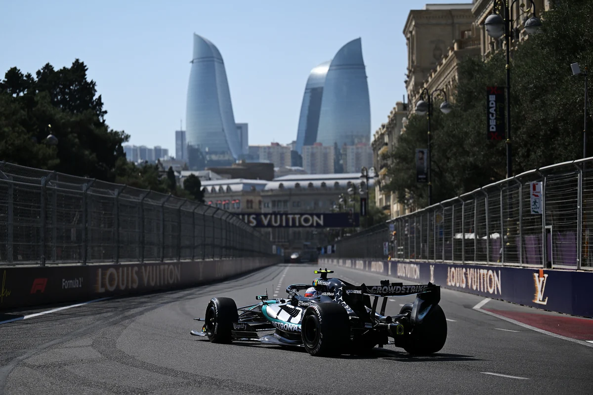 The Mercedes W17 of Kimi Antonelli on track at the Baku City Circuit with the Flame Towers behind, Azerbaijan Grand Prix 2026