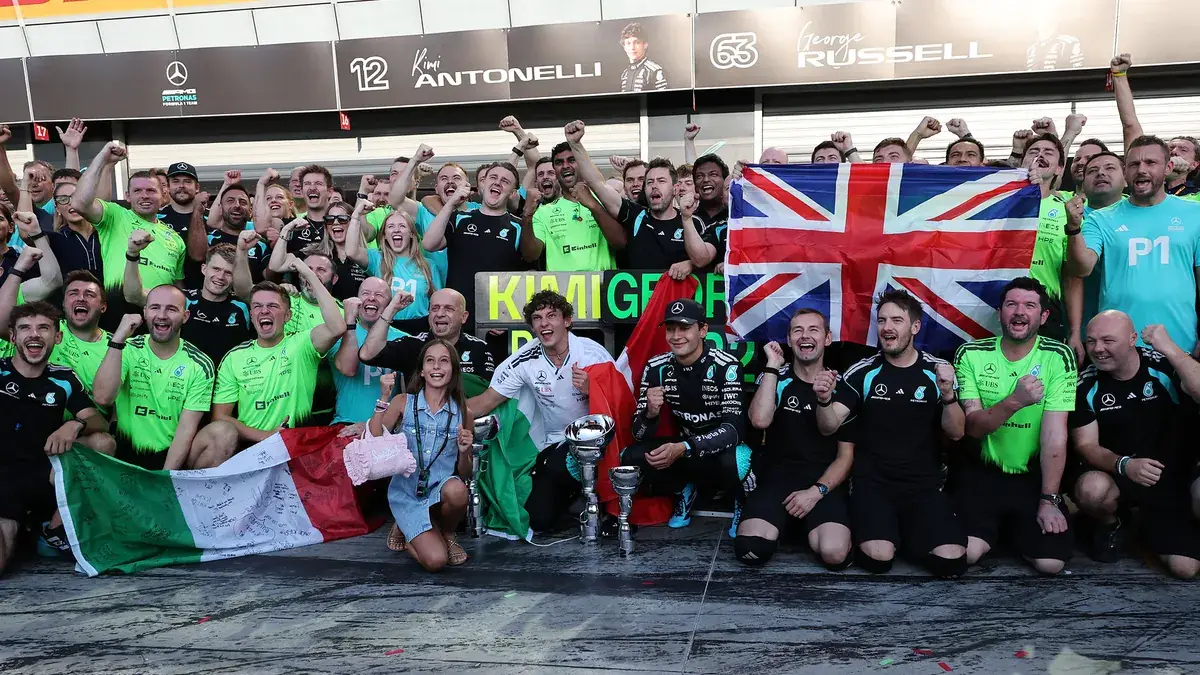 The Mercedes team celebrate the Italian Grand Prix win at Monza