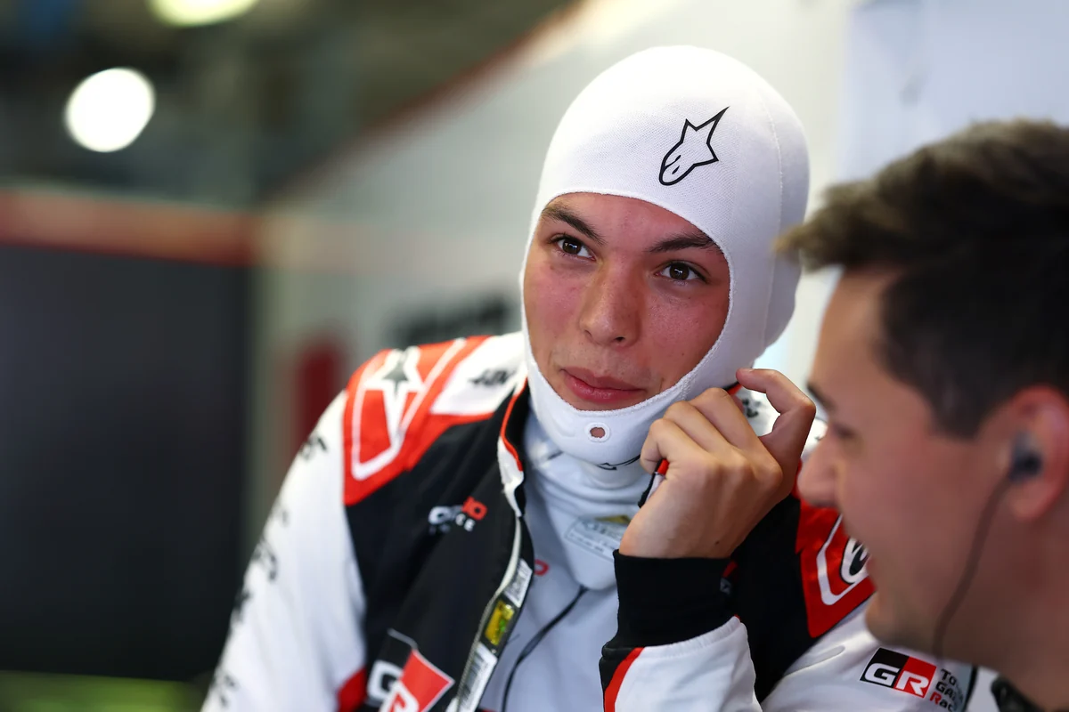 Oliver Bearman in a balaclava in the Haas garage at Monza