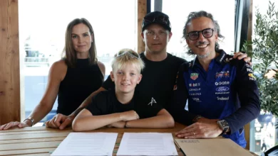 Robin Raikkonen signs for the Red Bull Junior Team alongside his parents and team principal Laurent Mekies
