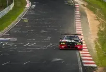 The number 77 Schubert Motorsport BMW M4 GT3 EVO on the Nordschleife during NLS9