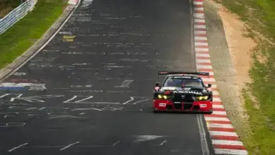 The number 77 Schubert Motorsport BMW M4 GT3 EVO on the Nordschleife during NLS9
