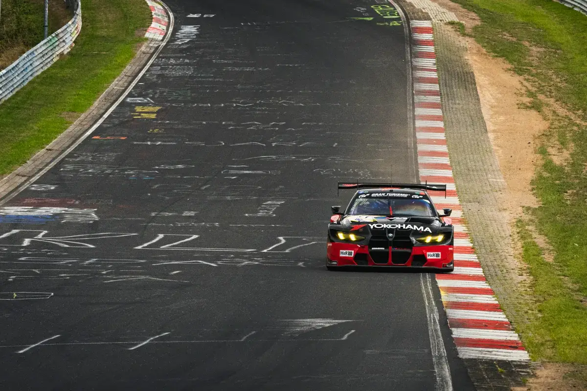 The number 77 Schubert Motorsport BMW M4 GT3 EVO on the Nordschleife during NLS9