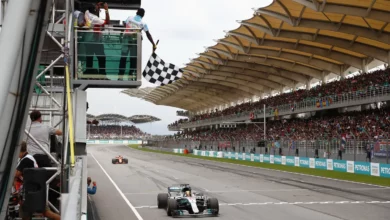 Lewis Hamilton's Mercedes takes the chequered flag on the Sepang main straight at the 2017 Malaysian Grand Prix