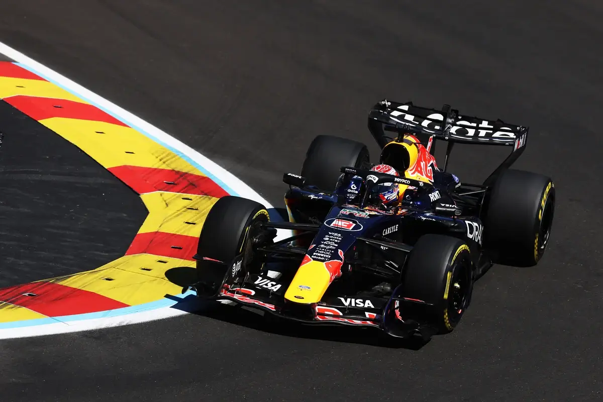 Max Verstappen puts his Red Bull over the red and yellow kerb at the Madring during the 2026 Spanish Grand Prix weekend