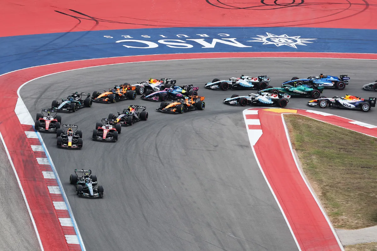 Kimi Antonelli in the number 12 Mercedes leads the field at the start of the 2026 United States Grand Prix