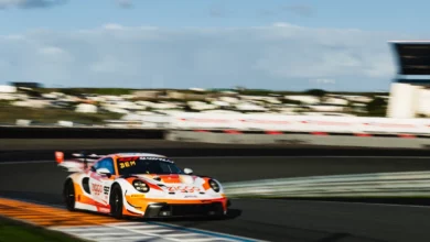 The number 93 Ziggo Sport Tempesta Racing Porsche of Eddie Cheever and Peter Dempsey on the kerb at Zandvoort