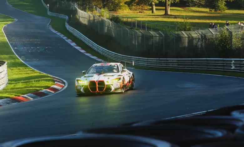 The number 23 Gamota Racing BMW M4 GT3 EVO at Pflanzgarten during NLS10 qualifying at the Nurburgring