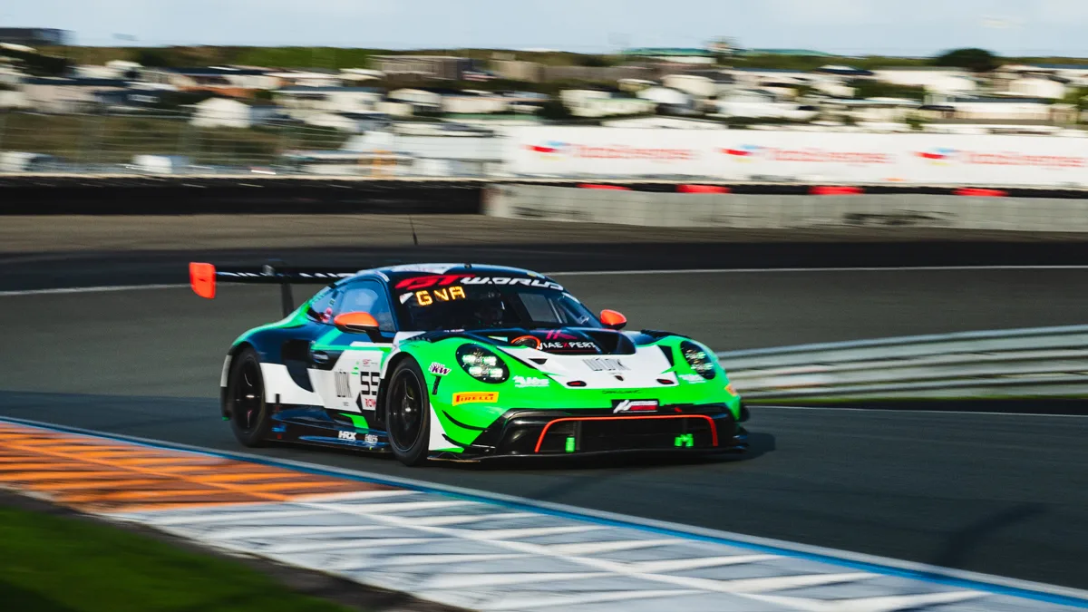 The number 55 Dinamic GT Porsche 911 GT3 R on track at Zandvoort