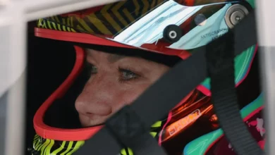 Laura van den Hengel in her helmet in the cockpit of the Iron Dames car at Zandvoort