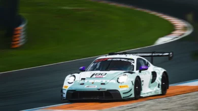 The number 80 Lionspeed GP Porsche 911 GT3 R of Bastian Buus and Ricardo Feller on track