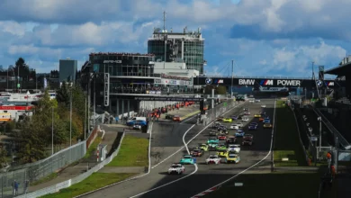The NLS10 field at the start on the Nurburgring GP circuit, led by the number 23 Gamota Racing BMW