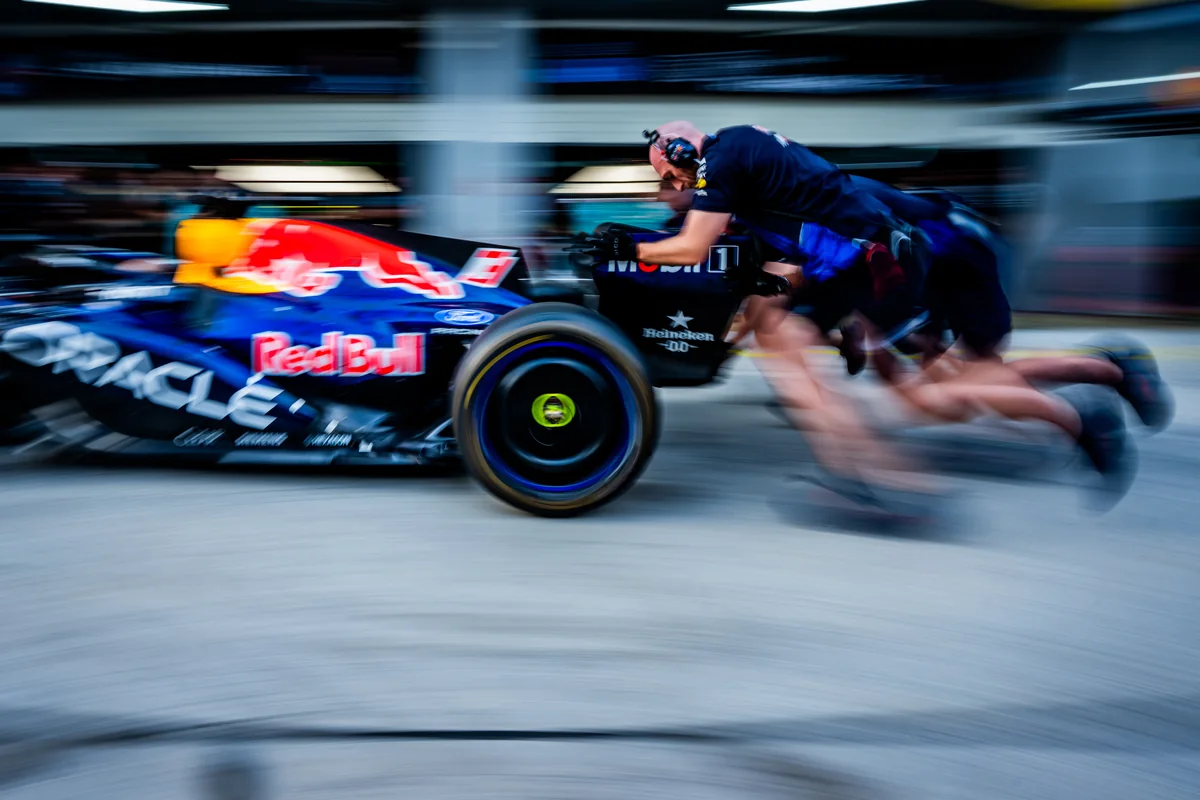 The Red Bull Racing pit crew practising a pit stop in the Sepang pit lane