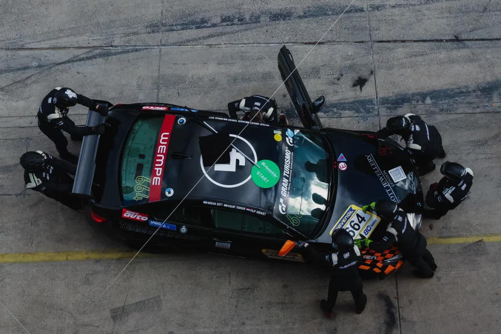 Overhead view of a BMW M240i pit stop at the Nürburgring