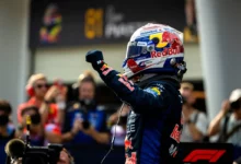 Max Verstappen raises his fist in parc ferme at Sepang