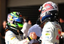 Max Verstappen and Isack Hadjar shake hands in parc ferme after qualifying in Austin
