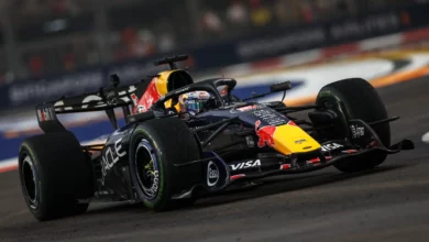 Max Verstappen in the Red Bull RB22 on track during the Sprint at Marina Bay Street Circuit, Singapore 2026